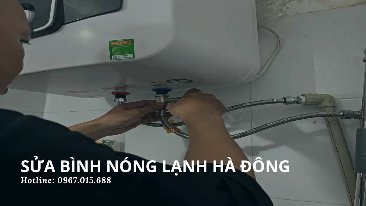 Nguyễn Minh Dương - Minh Dương Fix đang kiểm tra rò điện và thay sợi đốt bình nóng lạnh Ariston cho khách hàng tại Hà Đông