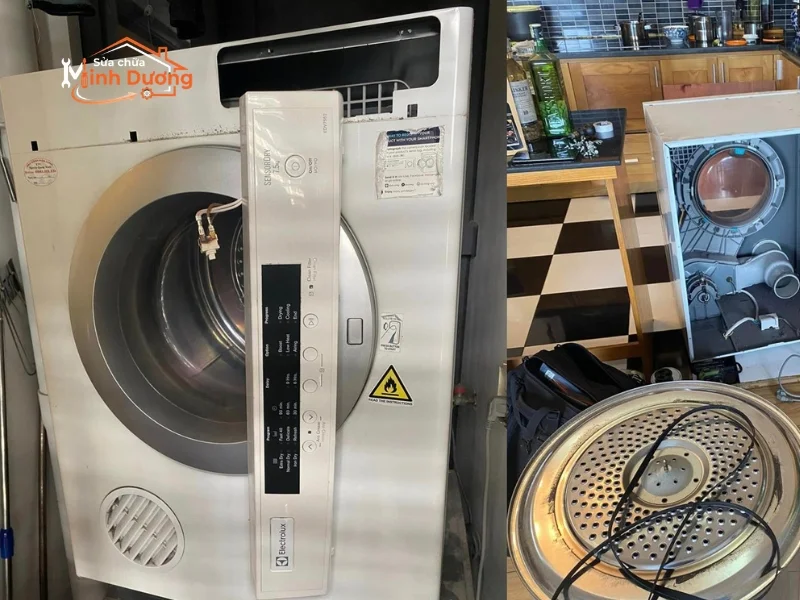 Thợ dùng kìm bọc cao su mở mâm từ máy giặt LG tại Rose Town