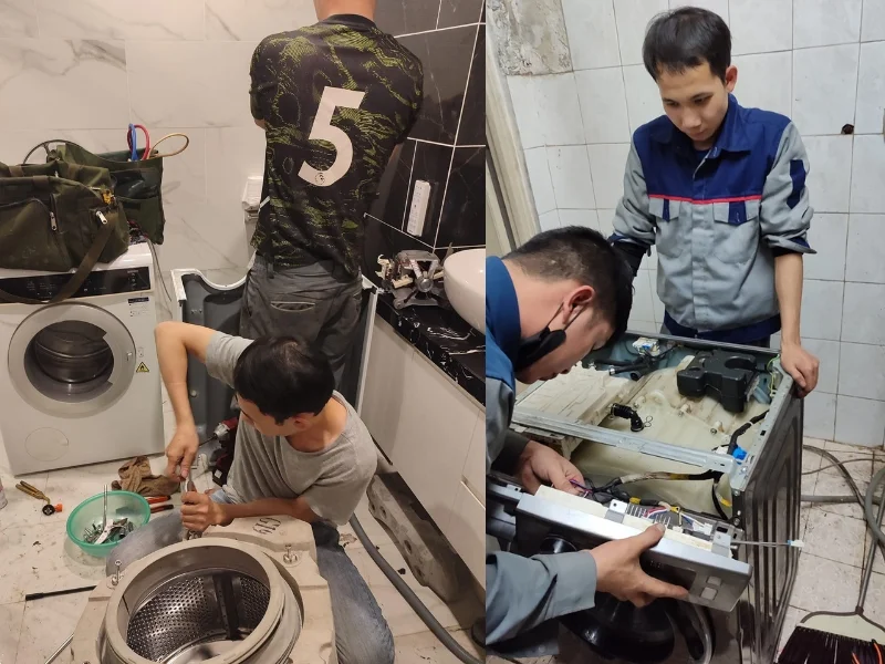 Thợ dùng máy siết bu lông chuyên dụng để cố định trục máy giặt